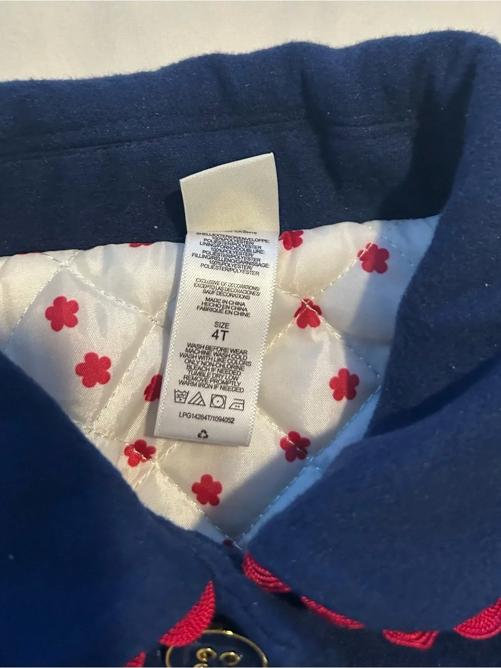 Little Me Navy Pea Coat with Red Scallop Trim and Bow.